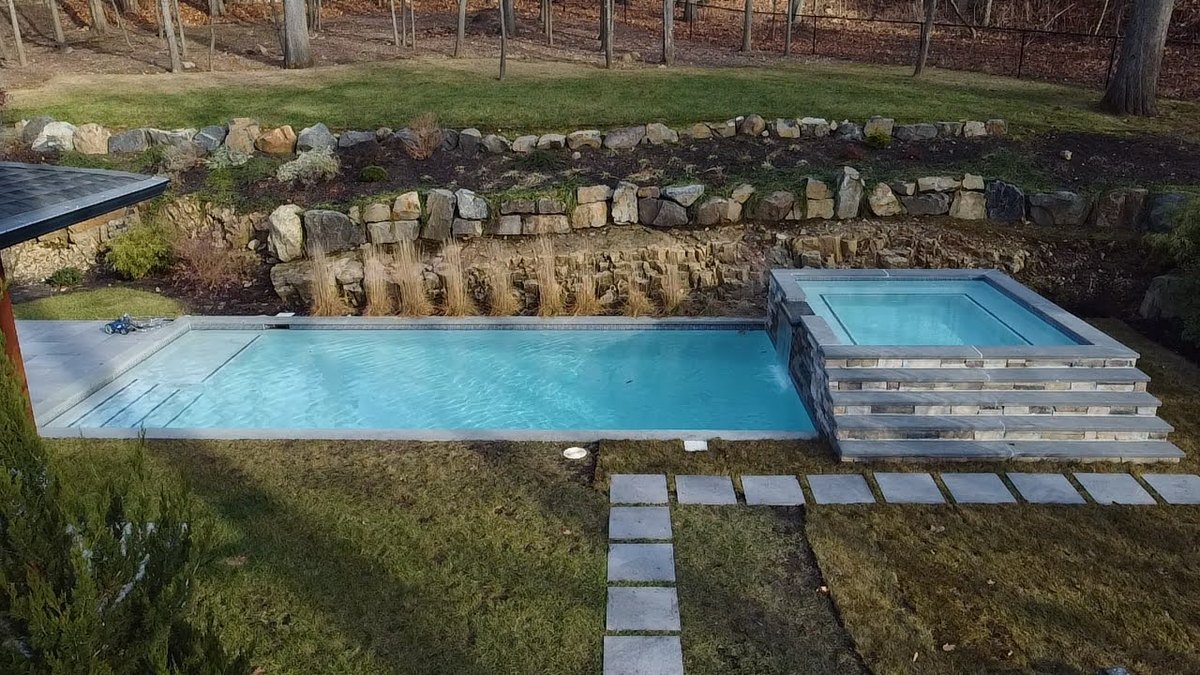 In-ground pool and spa inspected by Aquatic Pool Inspections for New Jersey home buyers